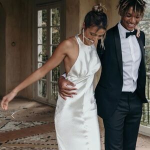 NEW Pearlescent ivory, textured satin, high neck wedding dress with racer back.